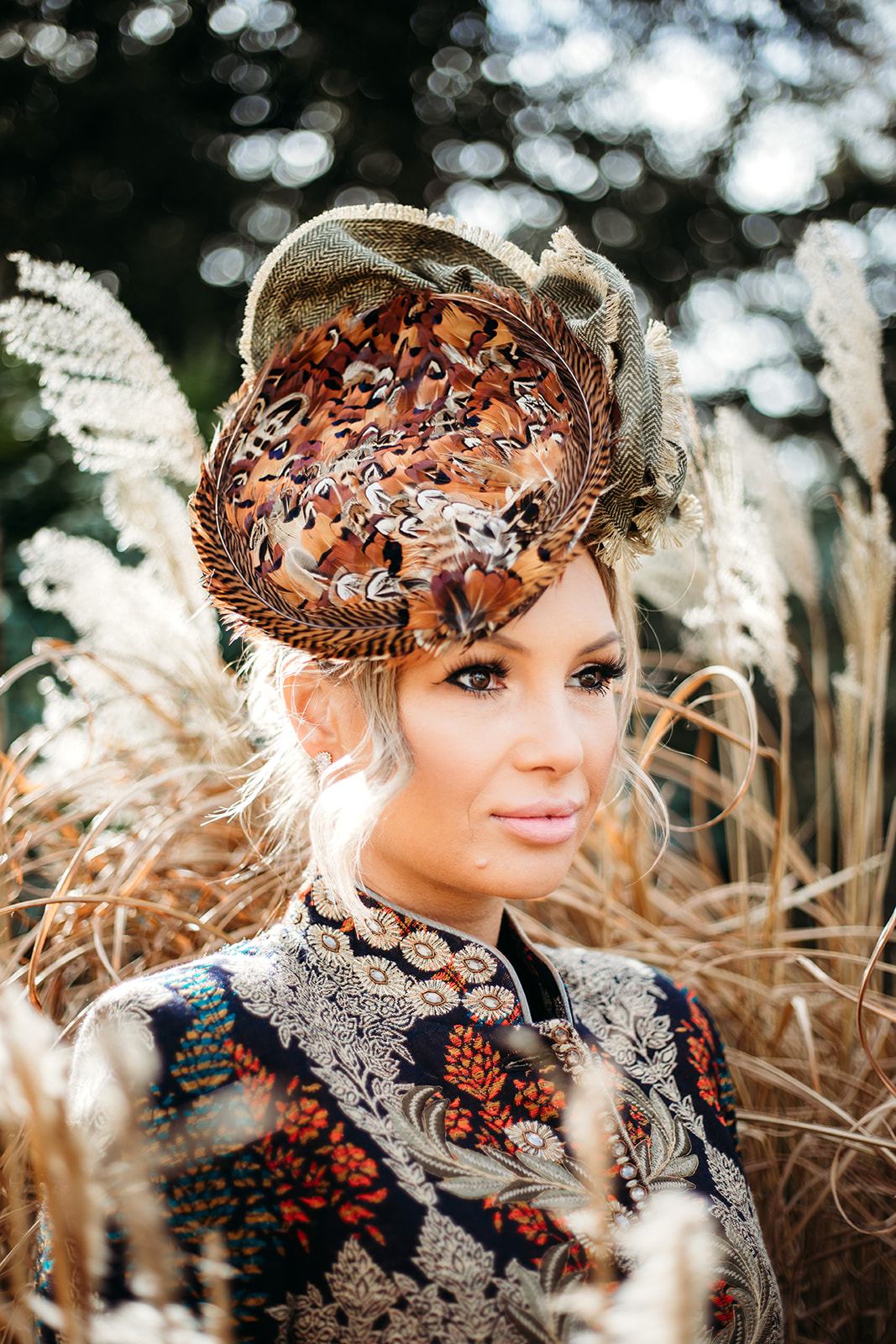 Model in beatrice von tresckow coat and hat by lisa von hallwyl millinery