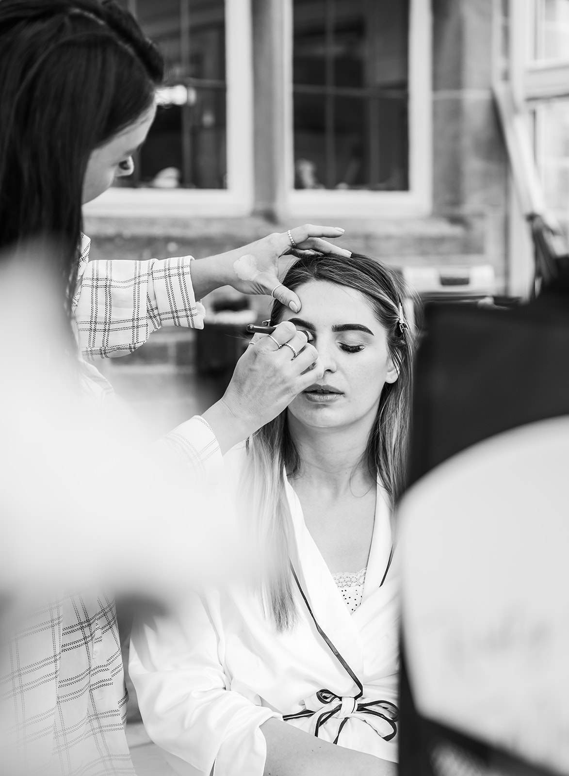 Bride getting ready for bredenbury court barns wedding 