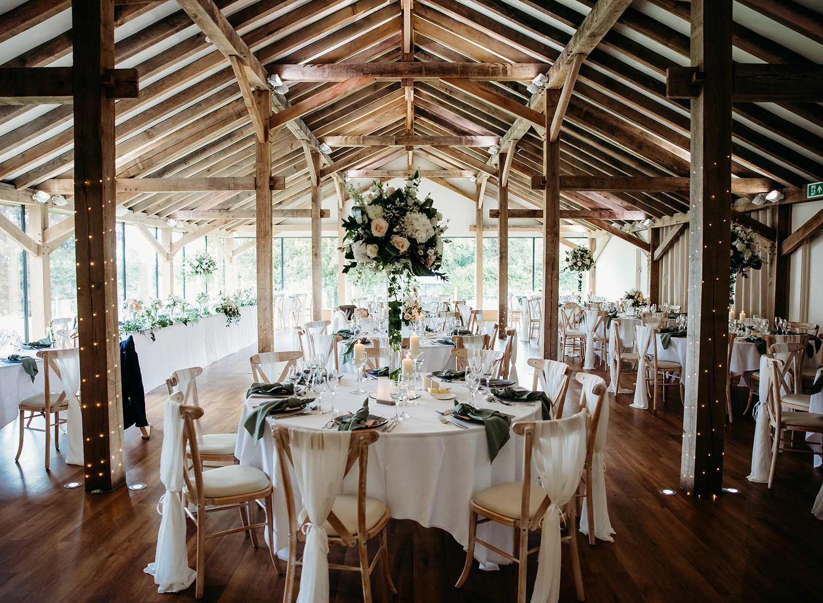 Documentary wedding photo of couple on Painswick Beacon to show editorial documentary photography style.