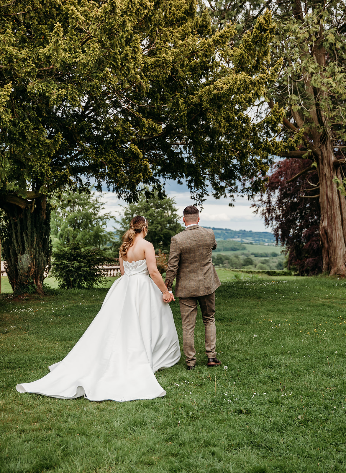 Bride and groom at bredenbury court wedding venue in the malverns