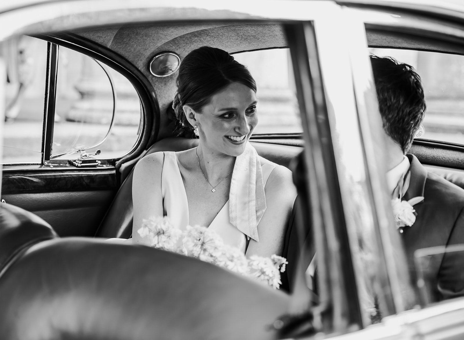 Vintage wedding car arriving at Pittville Pump Room in Cheltenham